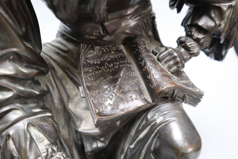 Jean Gout. A bronze model of a scholar painting to a globe, height 34cm